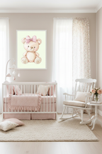 Cute teddy bear with pink bow print in blush pink nursery above crib